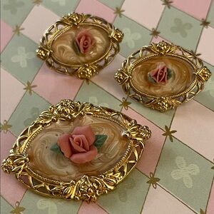 Vintage Avon Victorian Rose brooch and clip earrings set in gold tone filigree